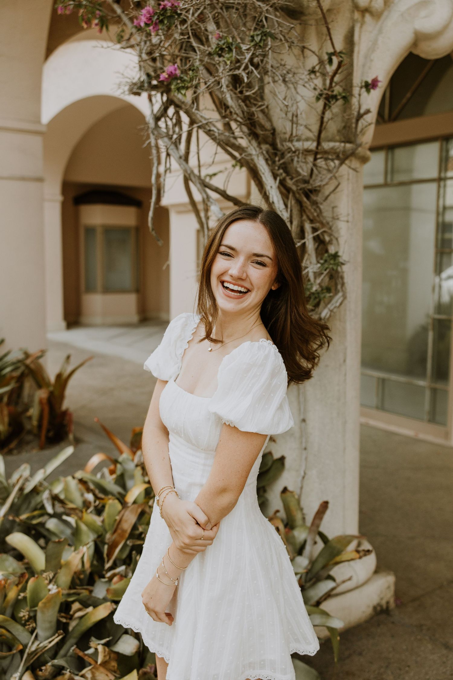 Senior graduation photos on Palm Beach Island off of Worth Avenue captured by Lindsay McDow Photography