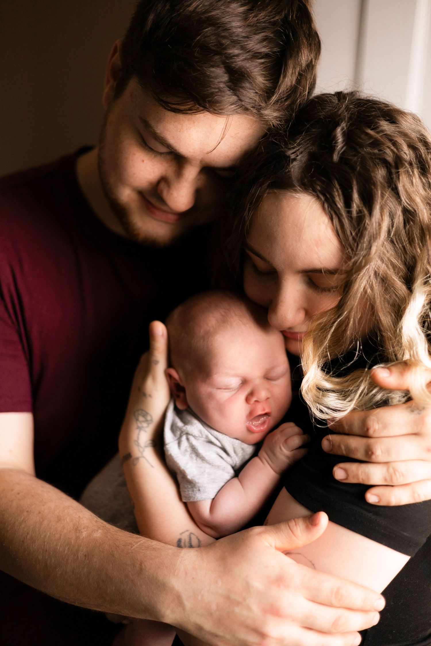 Intimate family photography sequence showing tender moments in warm lighting.