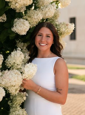 Ali, a Class of 2026 senior from Mineral Ridge High School in Northeast Ohio, poses during her senior portrait session. She is a cheerleader
