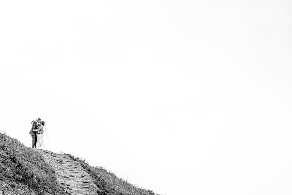 bride and groom on top of Bernal Heights Park, San Francisco