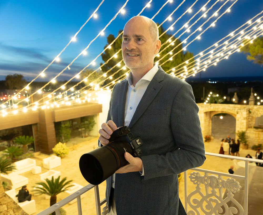 Wedding photographer Alan Harbord in action at  wedding