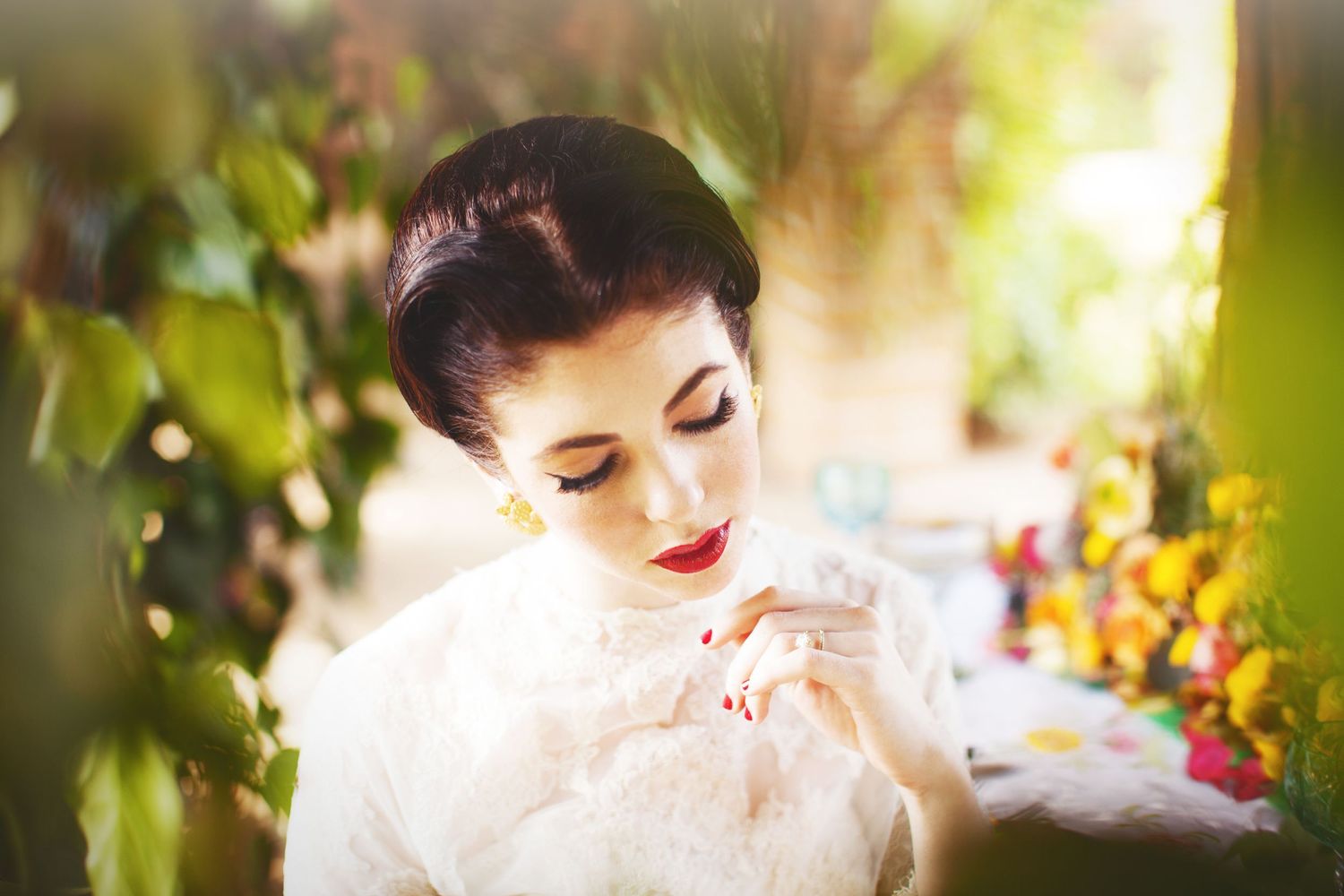bridal portrait with red lipstick and slicked back hair