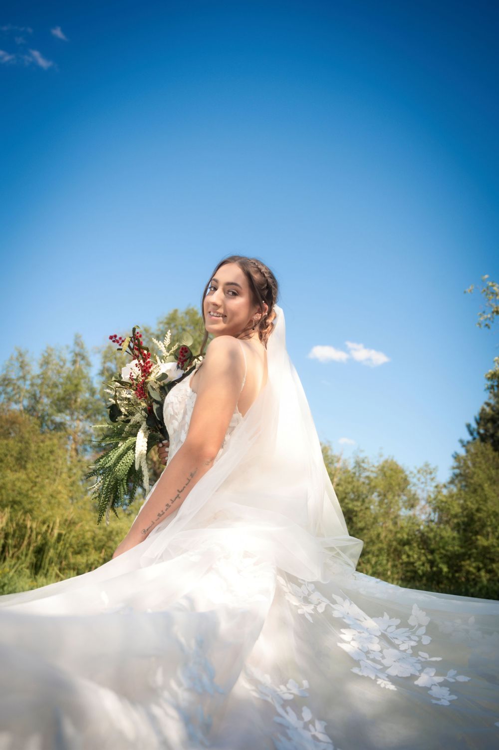 bride in a portrait on her wedding day veil spokane washington Taken by Jessica Rae Photography.