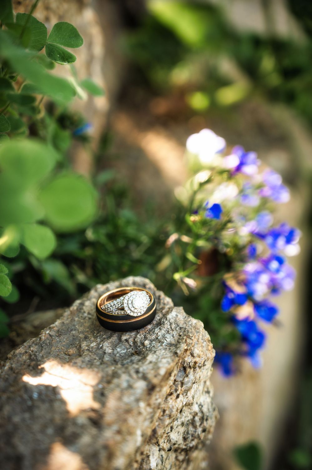 dreamy wedding ring details outside in the flowers in spokane washington