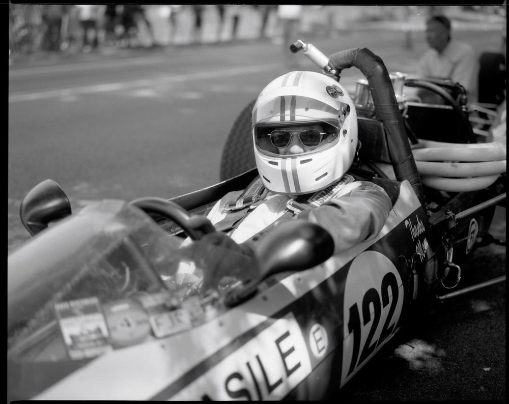 Closeup of a vintage formula race car with Leo Basile as driver. Pittsburgh Vintage Grand Prix. Shot on a medium format film camera.