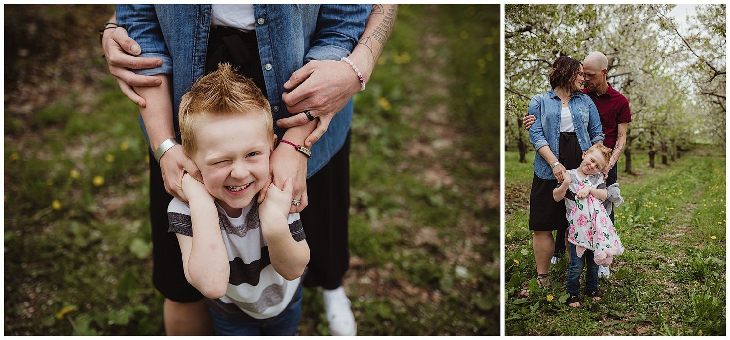 Candid family photos taken in blooming orchard during spring.
