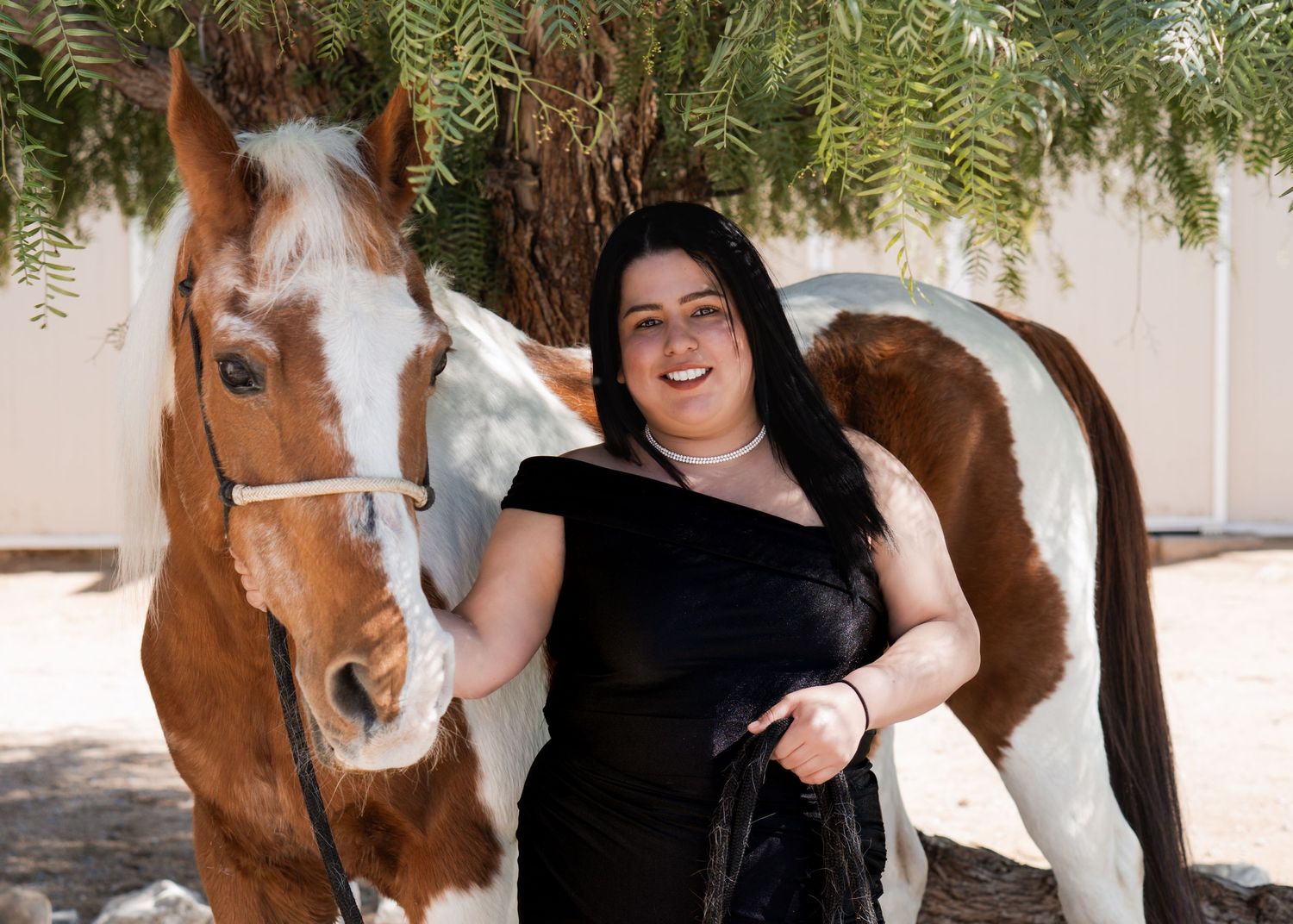a woman with a horse