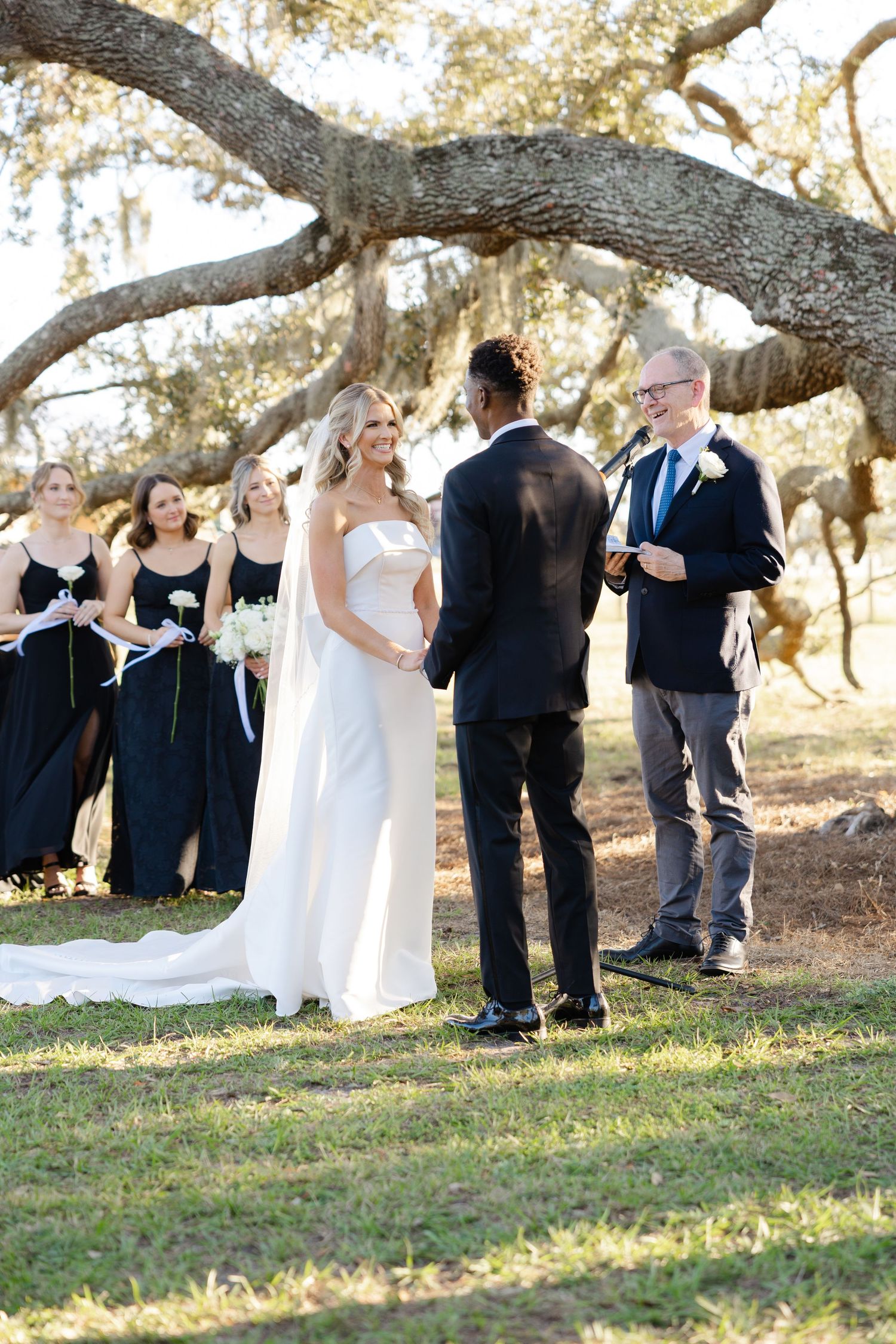 Romantic wedding couple embracing during a golden hour couples session photographed by Breanna Watts Photography in Huntsville Alabama.
