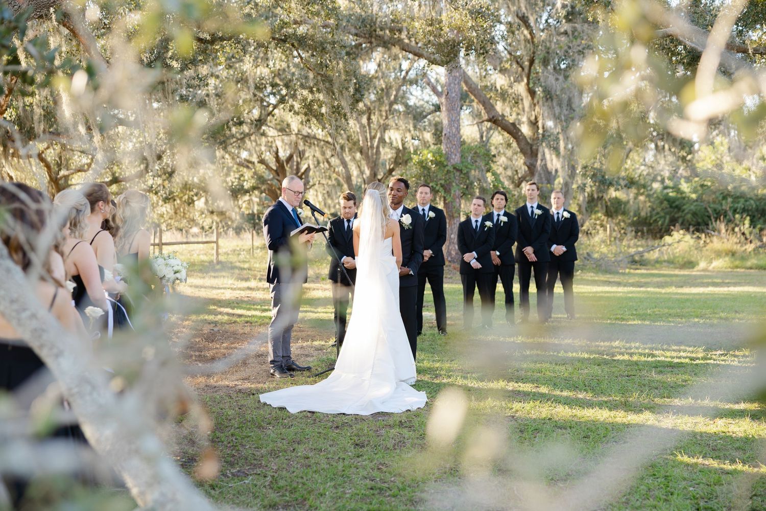 Romantic wedding couple embracing during a golden hour couples session photographed by Breanna Watts Photography in Birmingham Alabama.