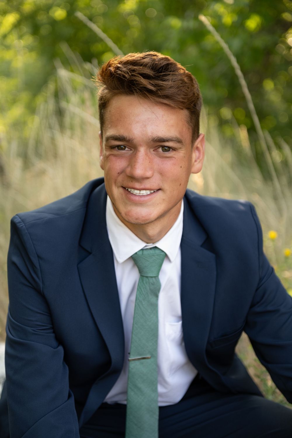 Polished senior boy photo in suit