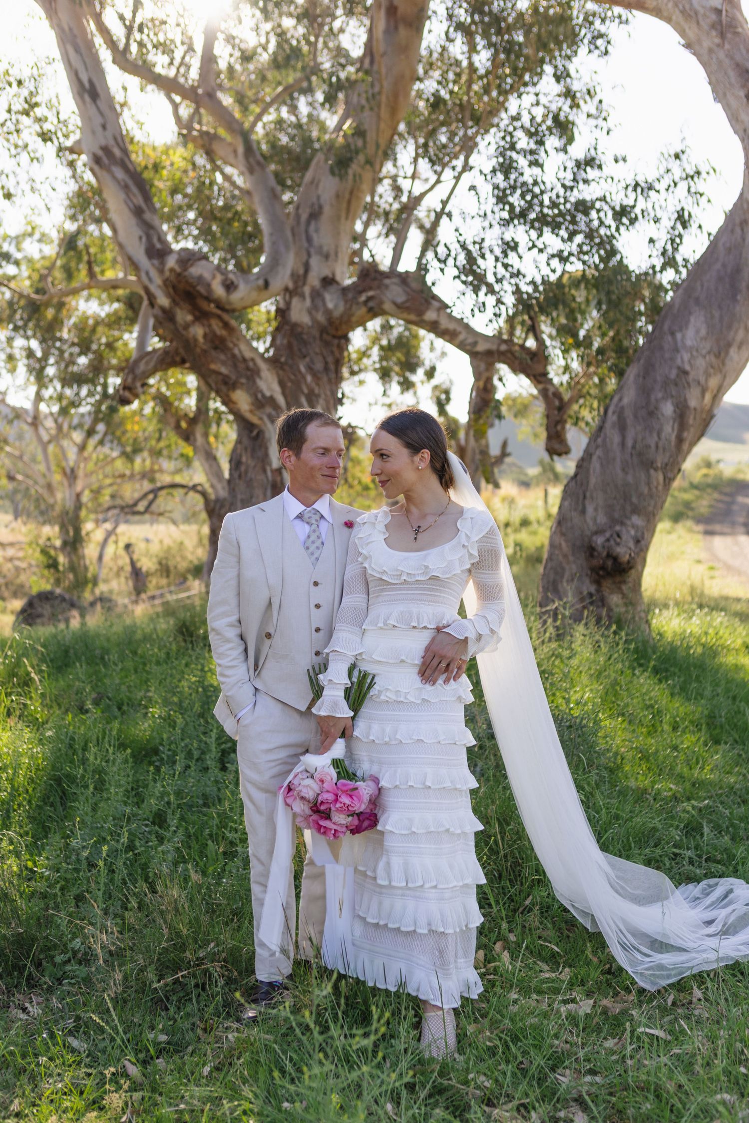 Bride and groom hugging at Scone NSW Country wedding