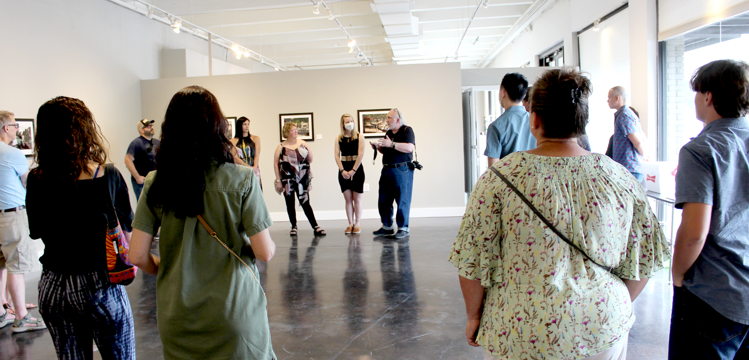 Street photography workshop and exhibition conducted by Tom R. Chambers in Austin, Texas.