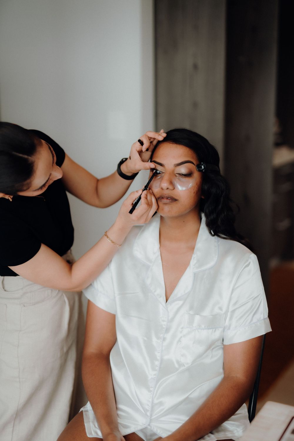 A detailed shot of eye makeup application during a beauty session.