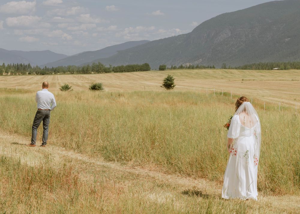Father and bride share first look moment in Bonners Ferry, ID.