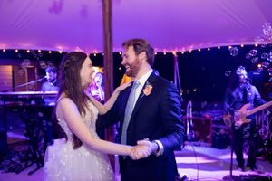 Bride and Groom dancing with band behind them at the Iron Gate Inn venue in Chico, California