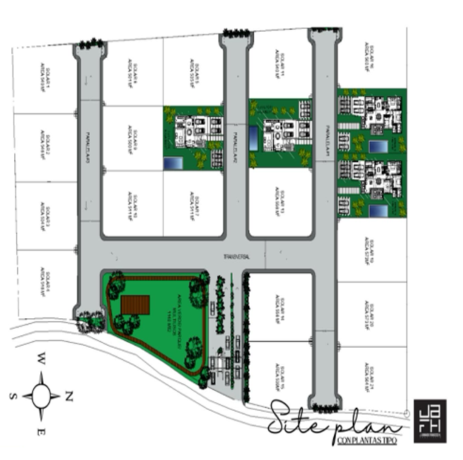 Aerial site plan layout showing residential development with multiple lots, green spaces, and road access points.