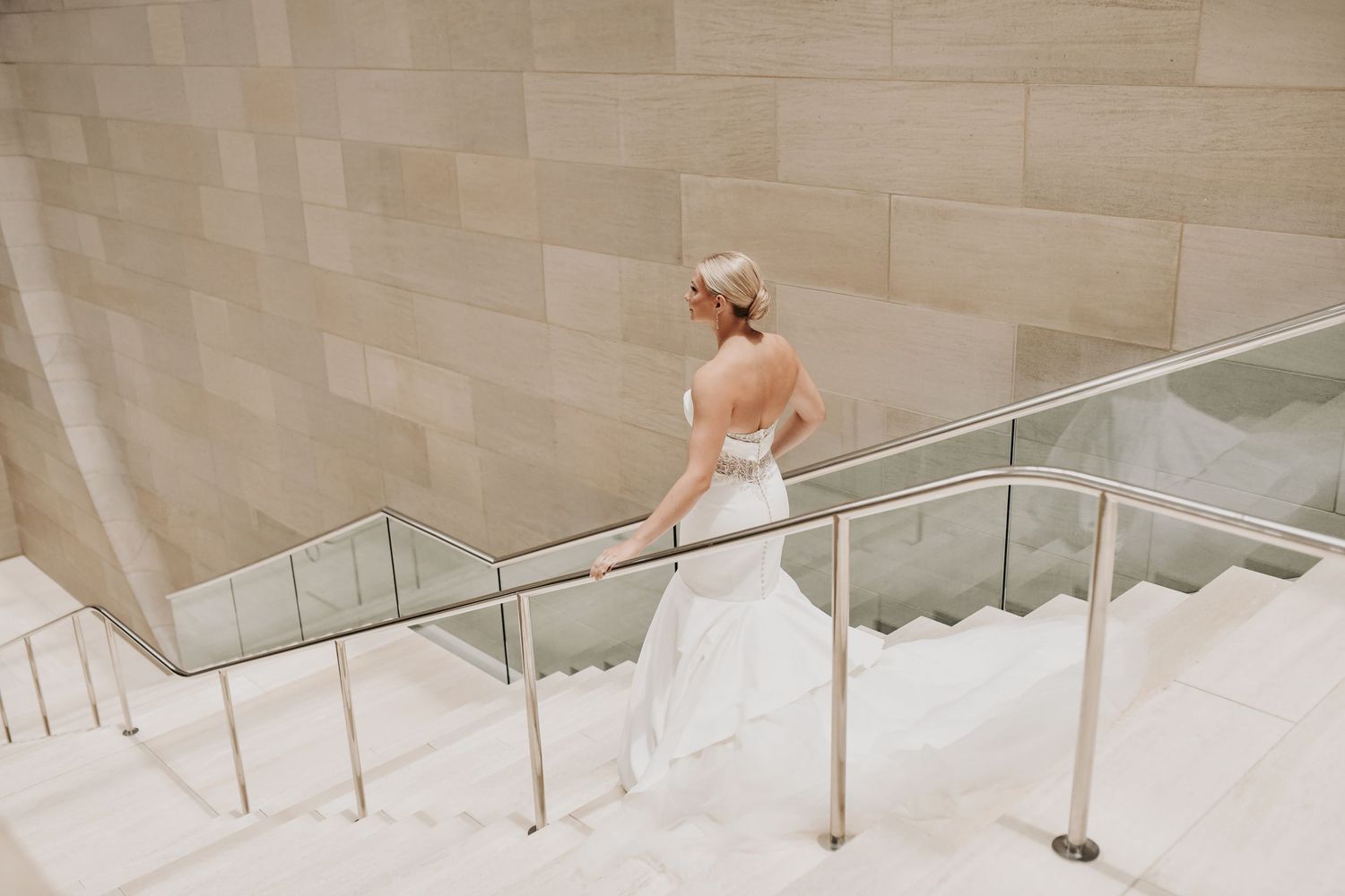 High-end Dallas bridal portrait with dramatic architecture and timeless wedding style