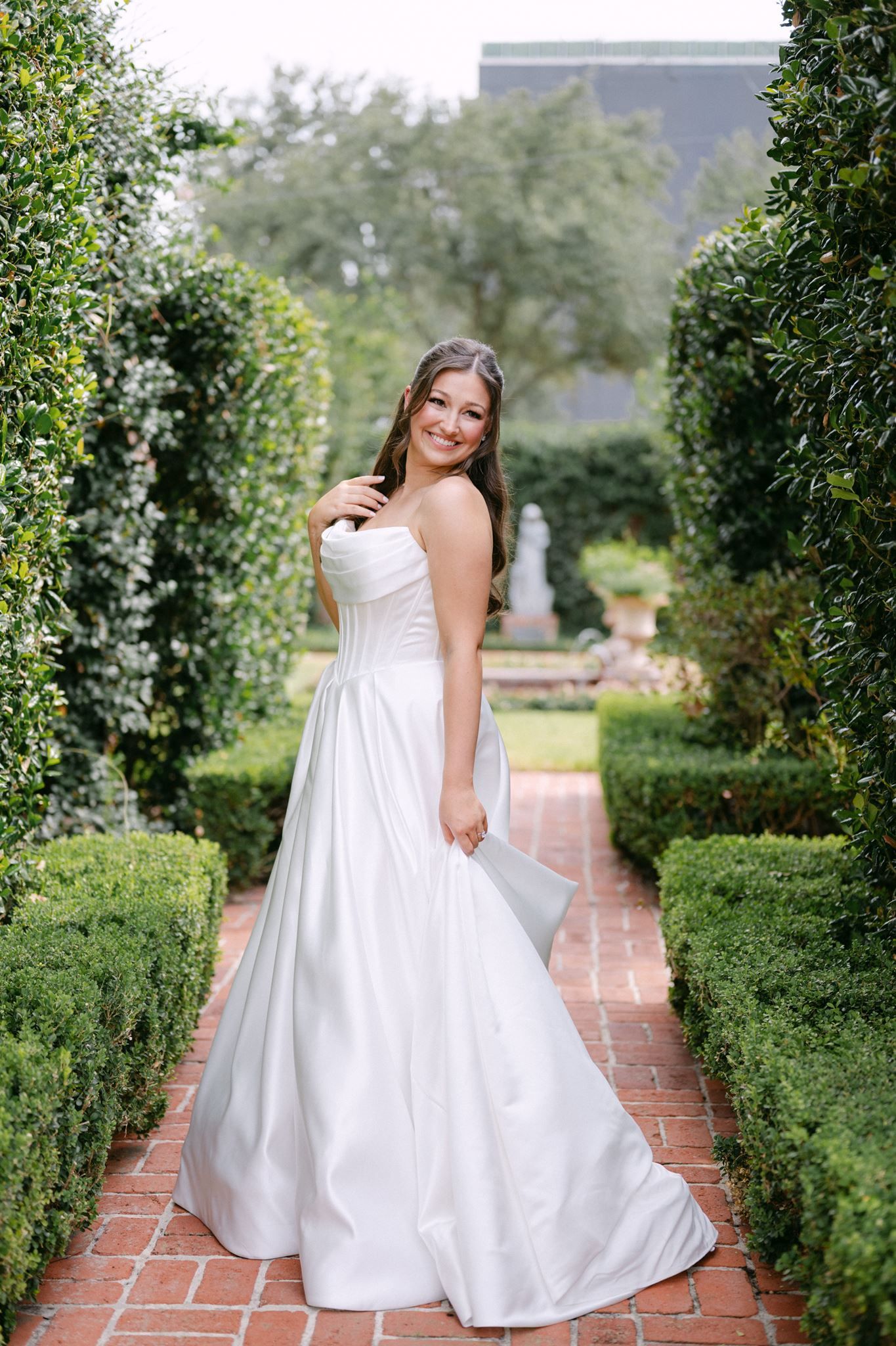 Emma posing in the center of the garden.