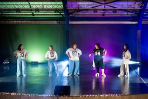 Colourful live dance performance captured on stage by Rynali Photographer.