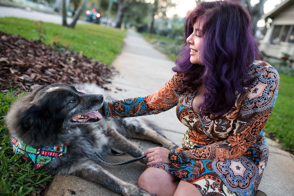Senior dog Rascal sharing a quiet moment with his person during a pet photography session