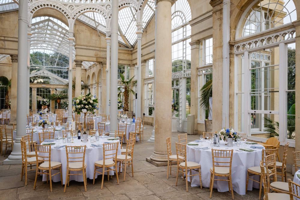 the wedding venue set up for dinner at Syon park