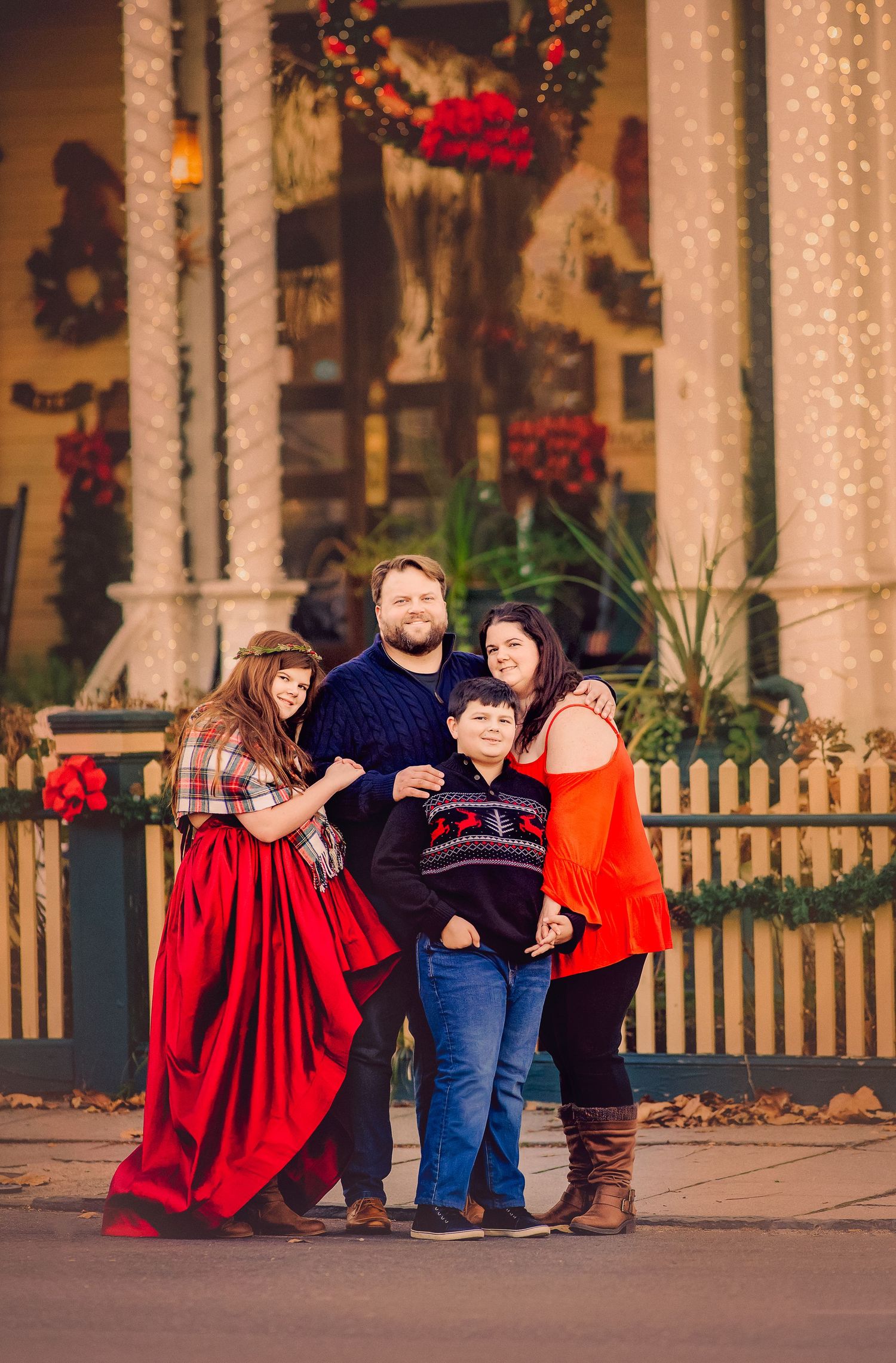 Family portrait among the historic architecture of Cape May, New Jersey.