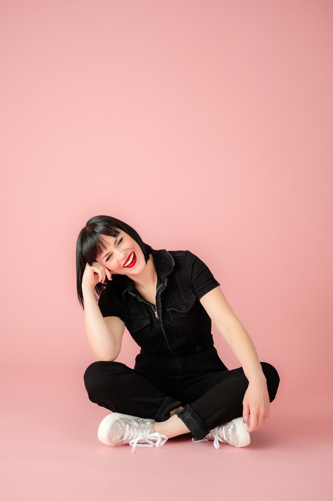 Brand photo of a myofunctional therapist in black romper at The Creative Photographer in Spring Tx