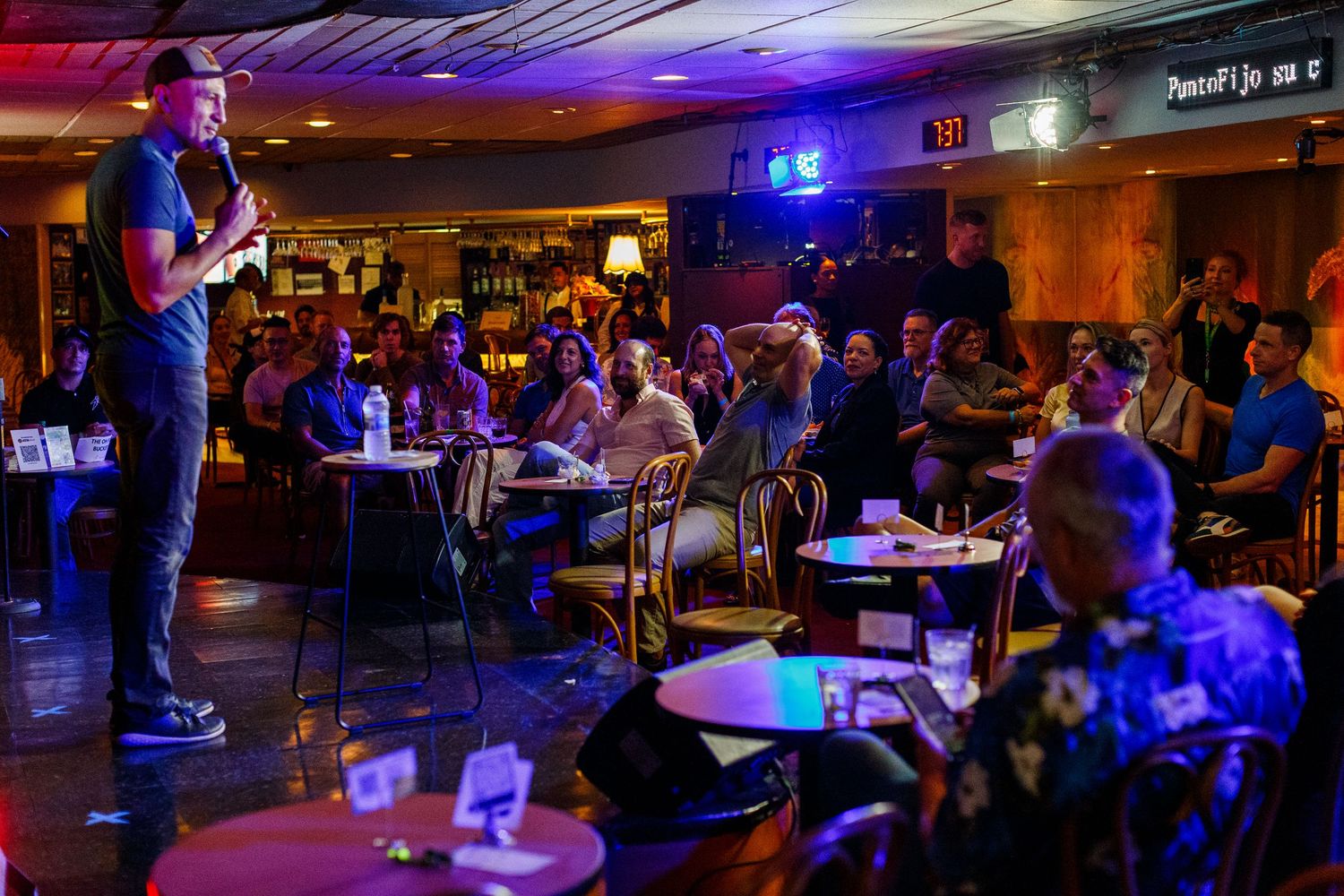Comedian on stage at a comedy show. San Juan, Puerto Rico.