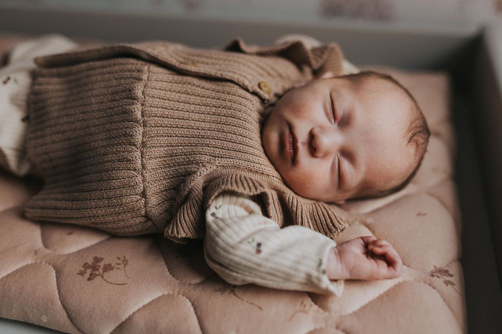 at home newborn photography session newborn baby asleep