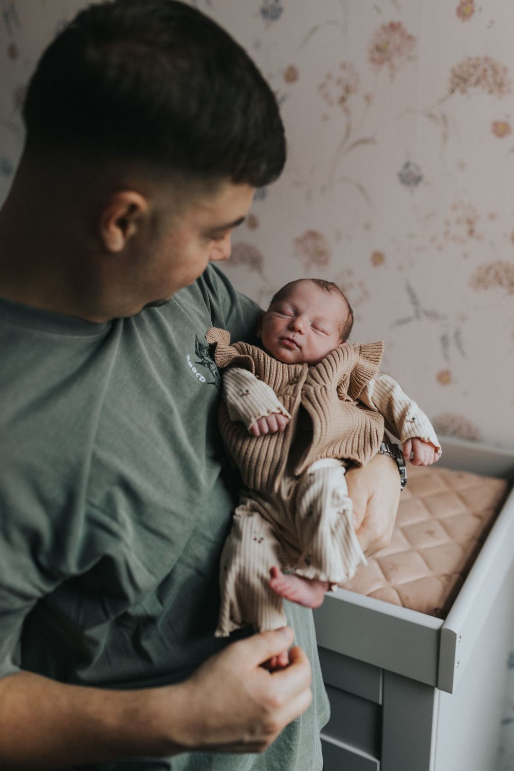 at home newborn photography session parents and newborn baby