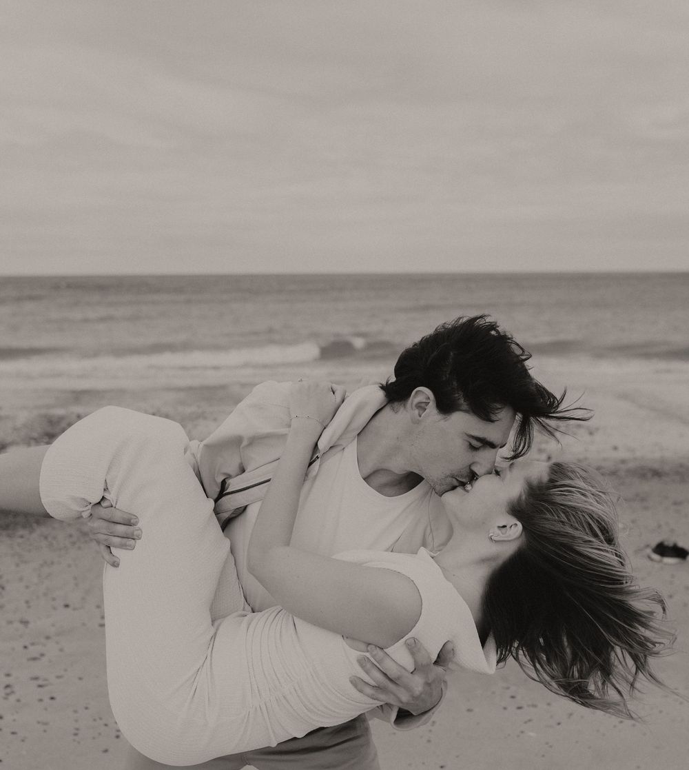 Engagement photography moments at the beach.