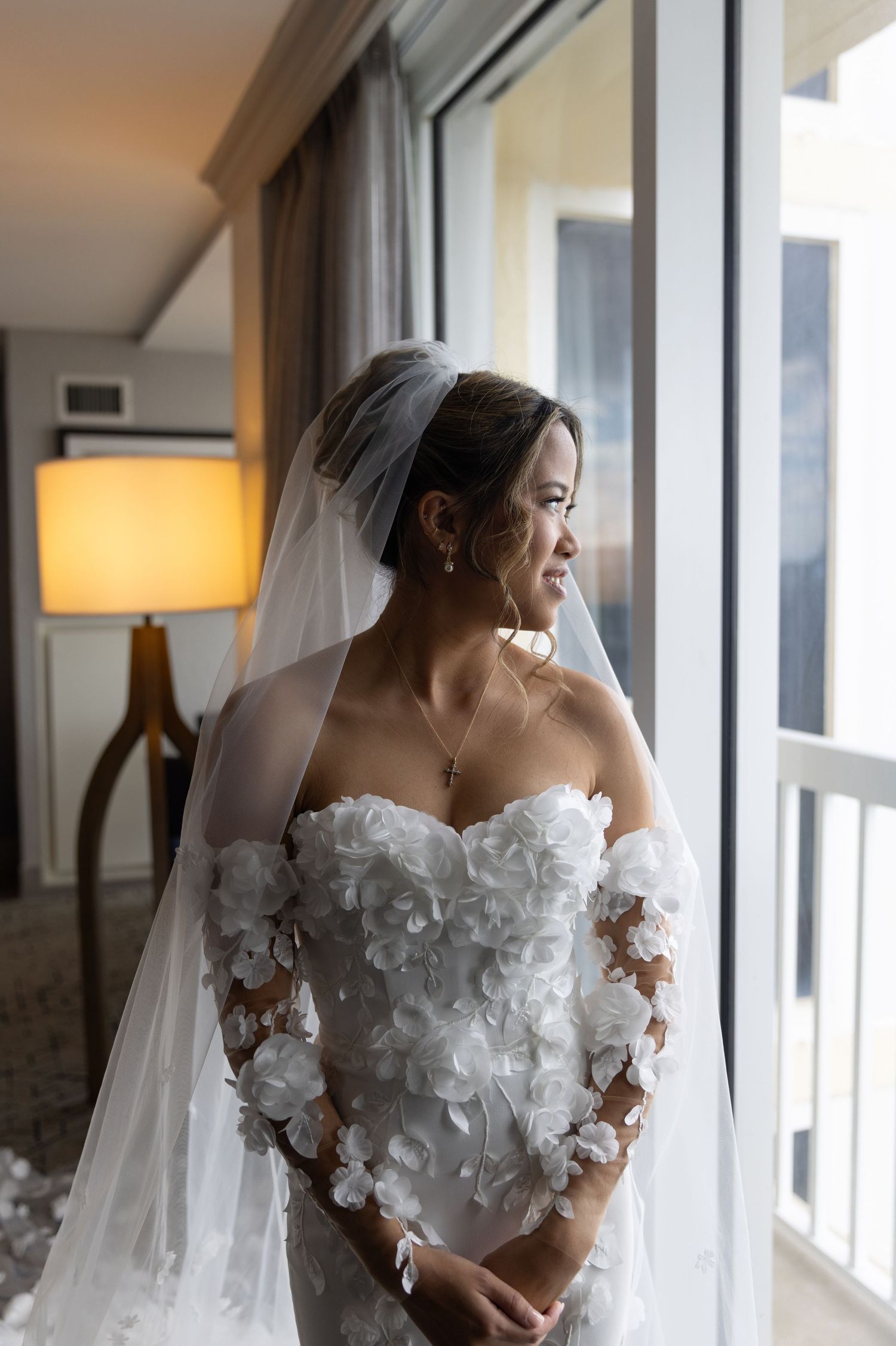 orlando luxury wedding photographer bride looking out before she walks down the aisle.