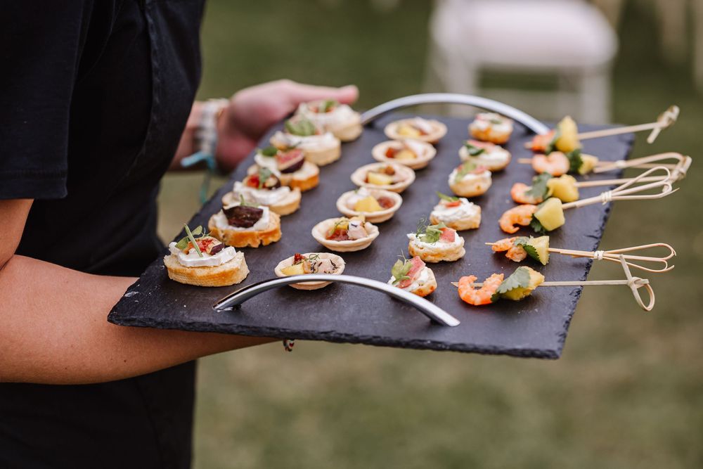 Canapes at the Waterside Country barn and Mill a lakeside wedding venue near Taunton. Relaxed Somerset Wedding photographer