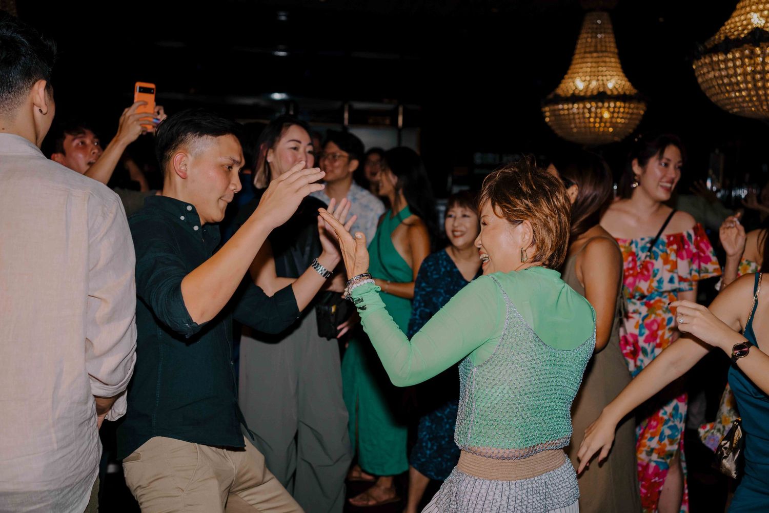 guests dance at a wedding afterparty in siri house dempsey singapore