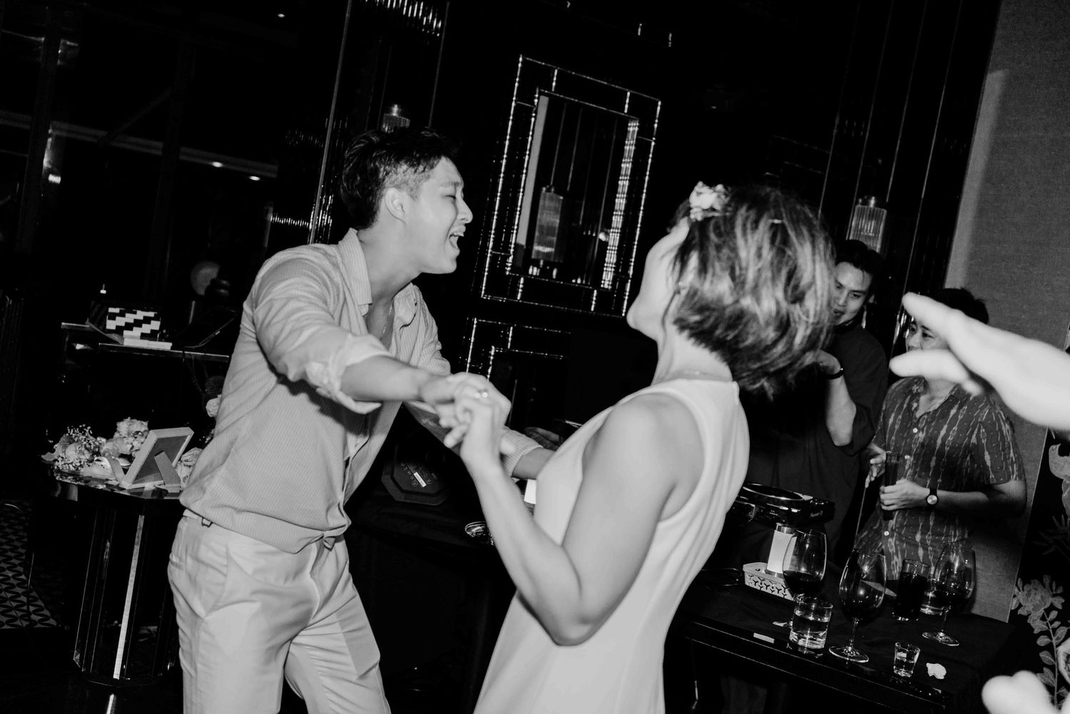 bride and groom dance at a wedding afterparty in dempsey singapore