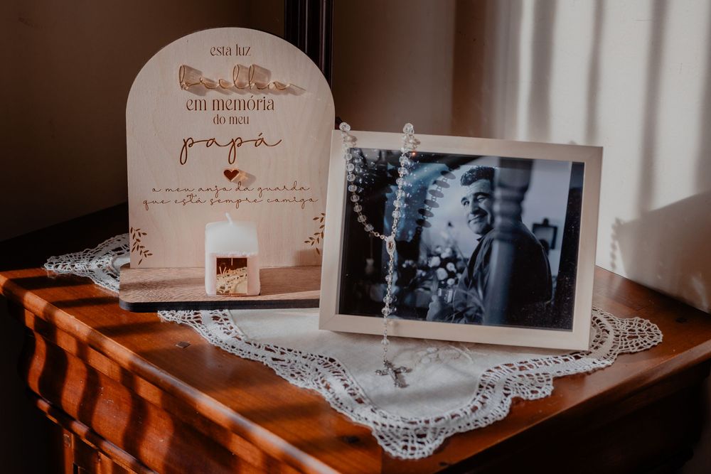 Vintage-style cards and decorative lace doilies arranged on a wooden surface create a nostalgic display.