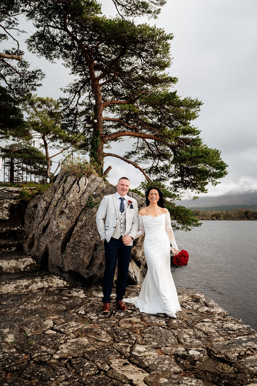 Bride and groom laughing during relaxed Killarney elopement by Sarah Kate Photography