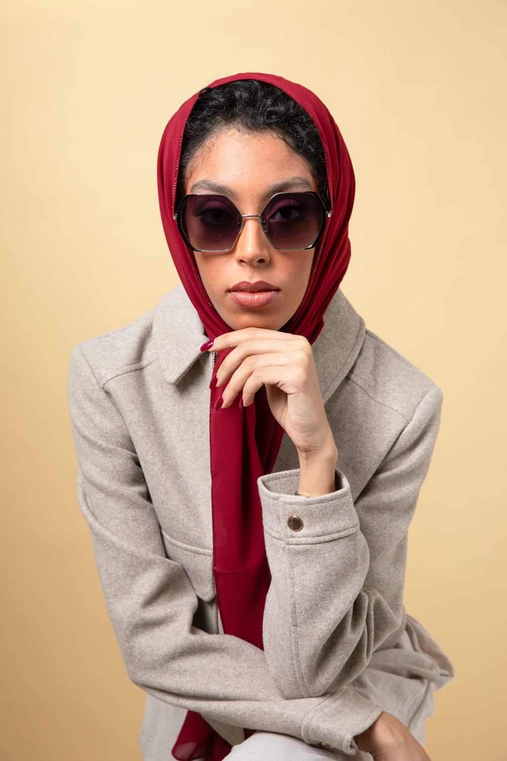 Portraitae indoor scarf photoshoot featuring elegant models in Dubai studio