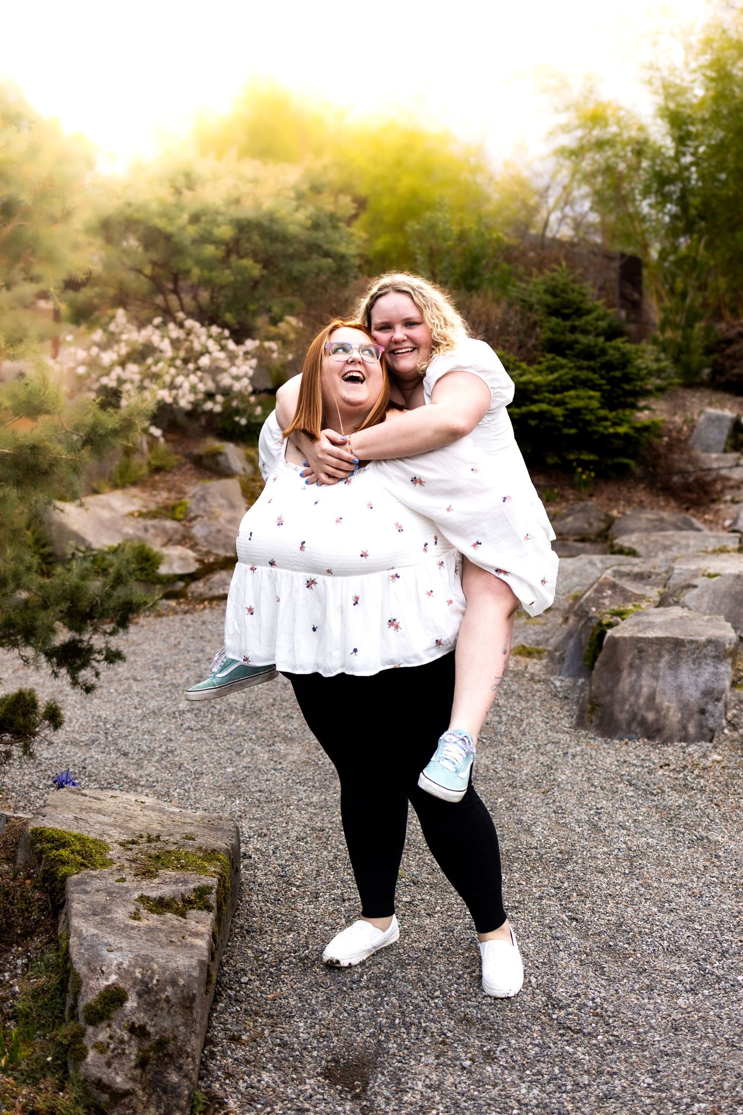 Candid moments of two people laughing and posing on rocky outdoor terrain.