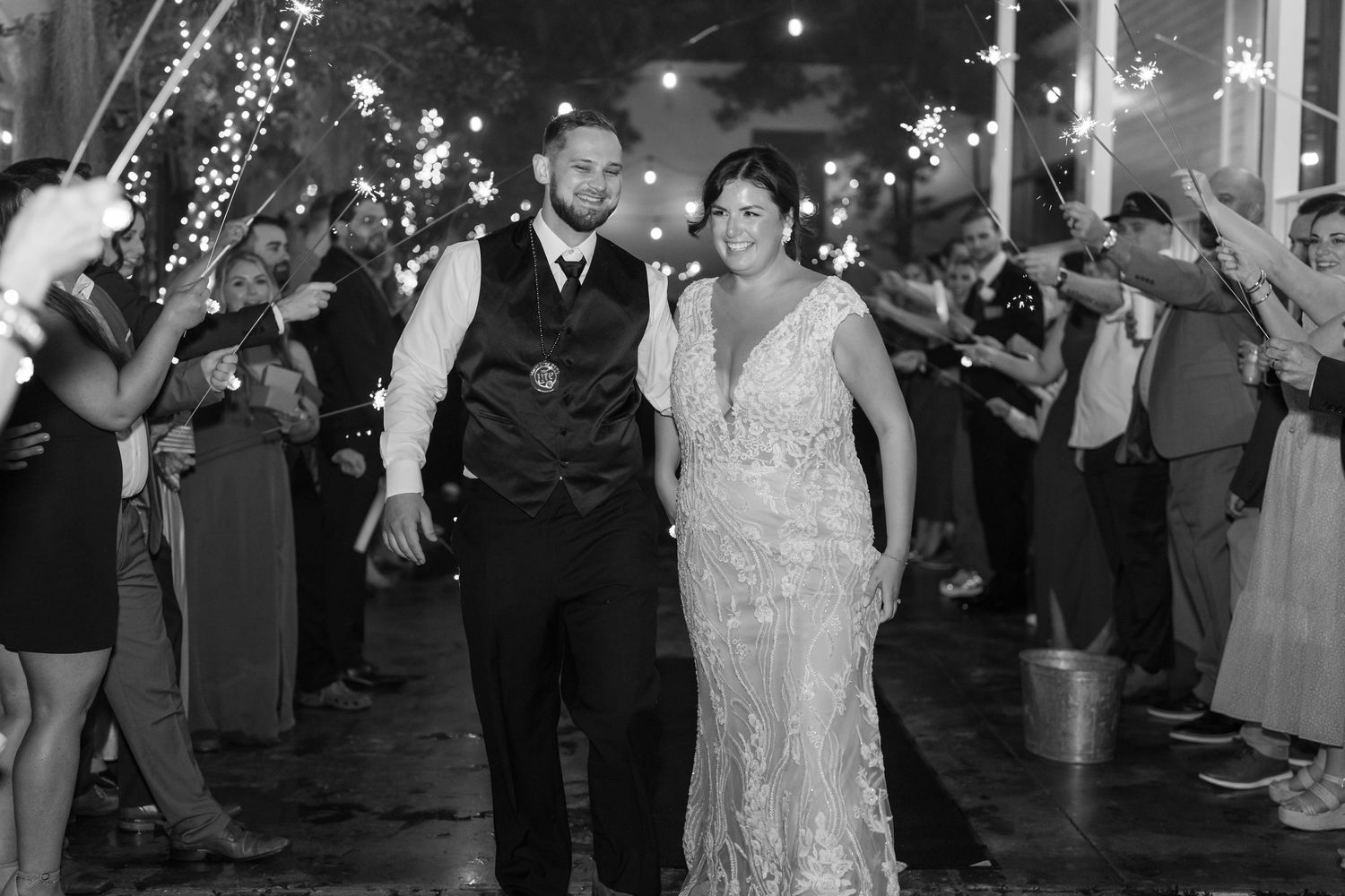 bride and groom exit with sparklers at benedict's plantation in Mandeville, LA