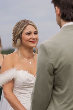 Bride close up during wedding ceremony Bay of Fundy wedding photography, overcast rainy wedding day photography New Brunswick Canada