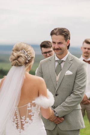 Bride and groom exchange vows at Hopewell Highland wedding in Alma New Brunswick wedding photography, intimate wedding, emotional vows