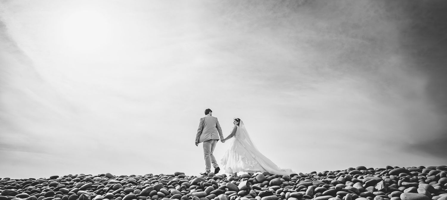 A series of black and white landscape photographs showing silhouettes against dramatic cloudy skies.