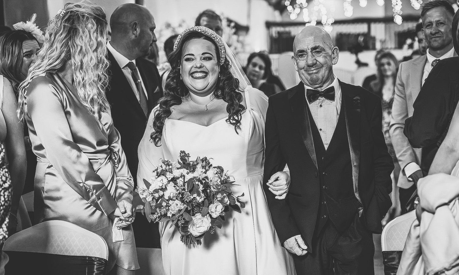 Black and white collage of joyful wedding moments showing guests and couples celebrating together at a reception.