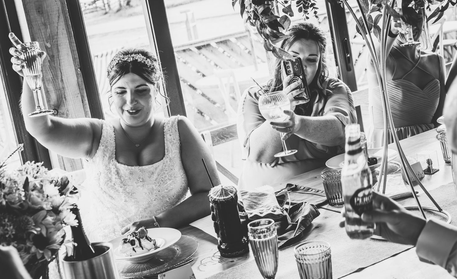A black and white collage of candid photos showing people enjoying drinks and social gatherings at a bar or restaurant.