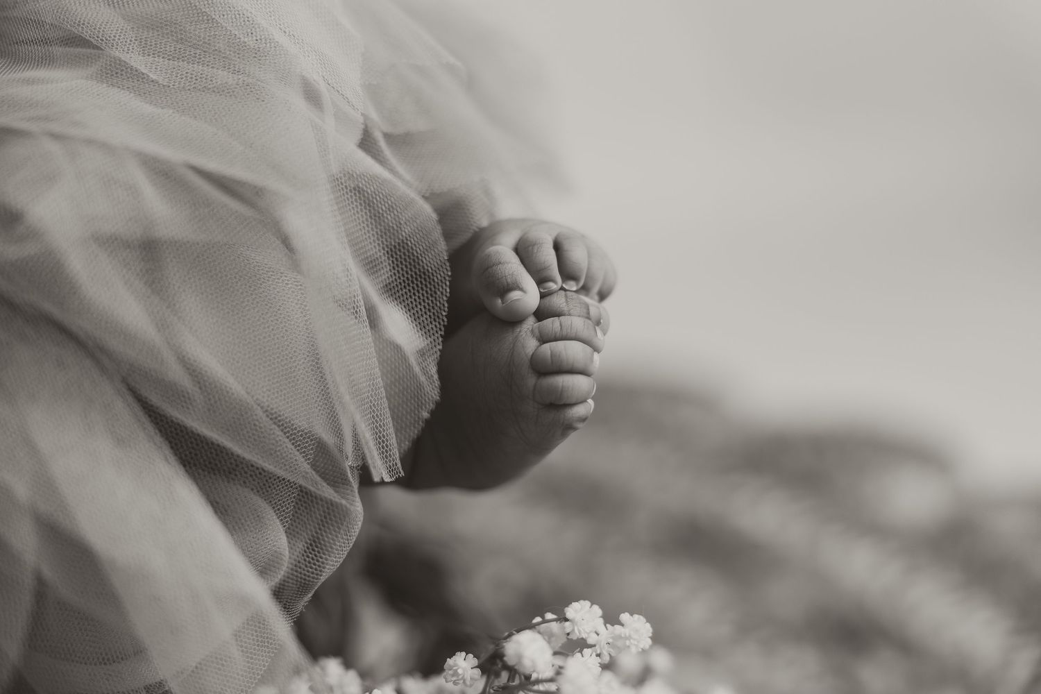 A collection of black and white wedding photos showing romantic moments and details.
