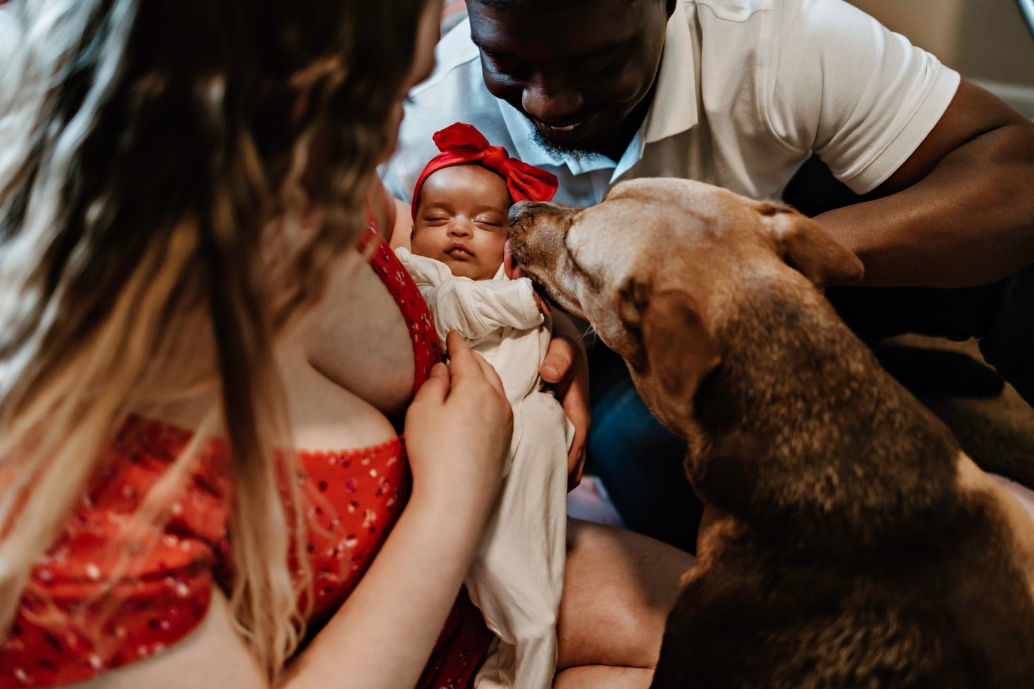 Black and white intimate family moments captured in documentary style.