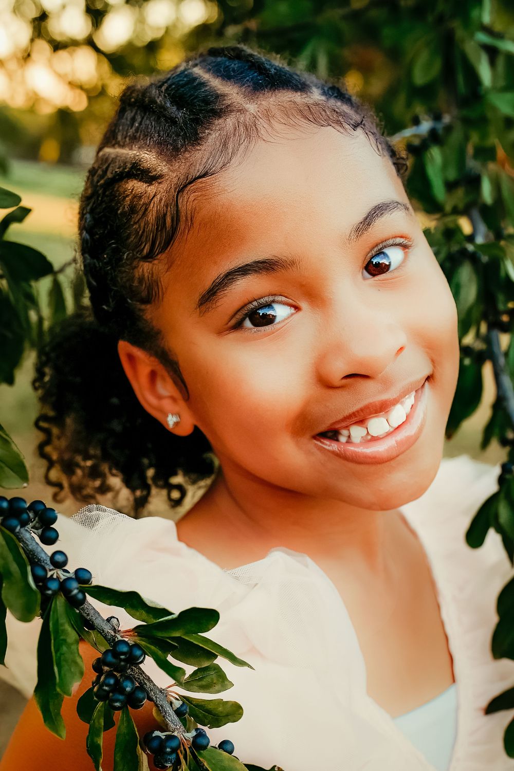 Close up portrait of a young girl with a natural outdoor background with greenery in North Richland Hills, TX