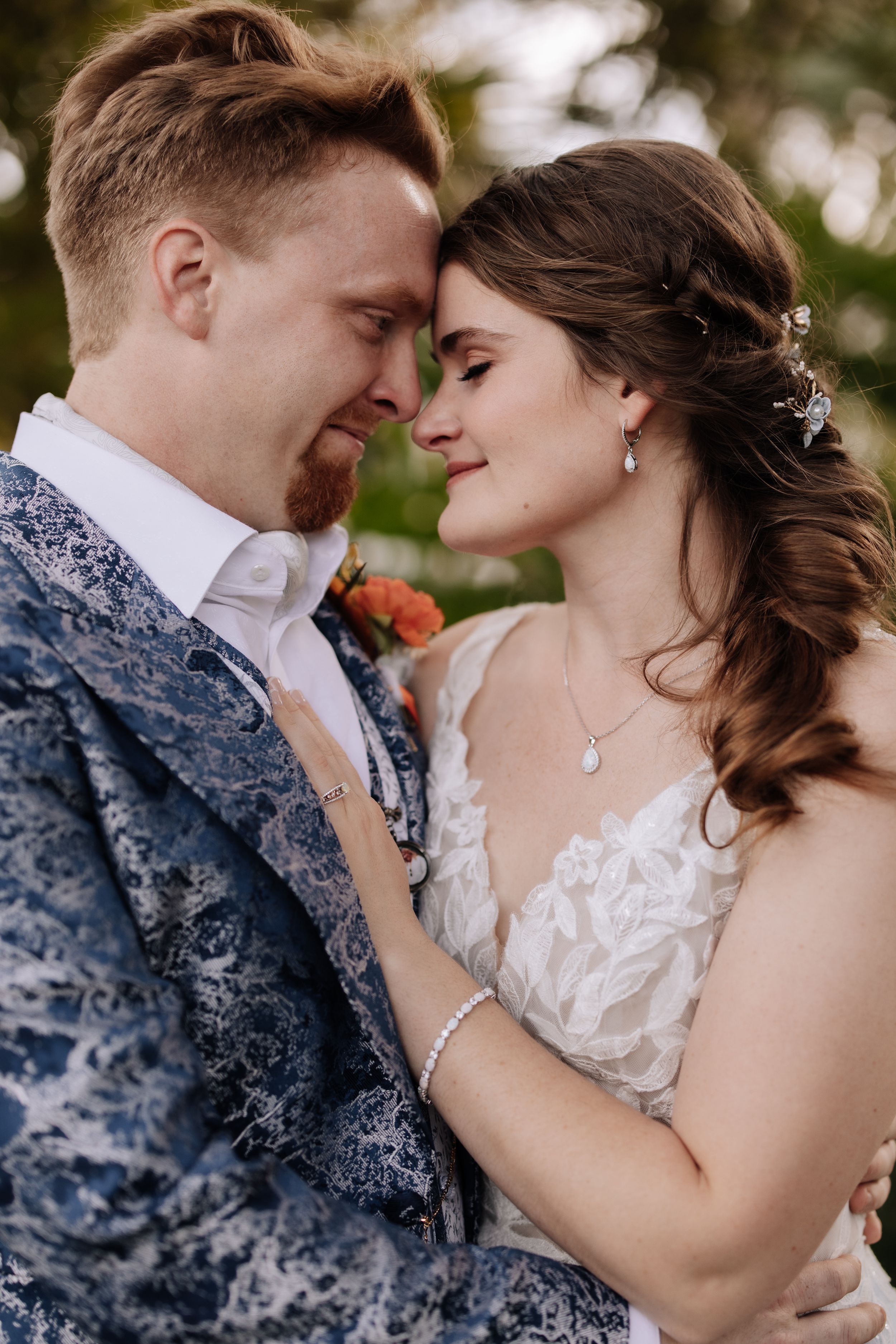 A romantic wedding couple in formal attire share intimate moments in a series of close-up outdoor portrait shots.