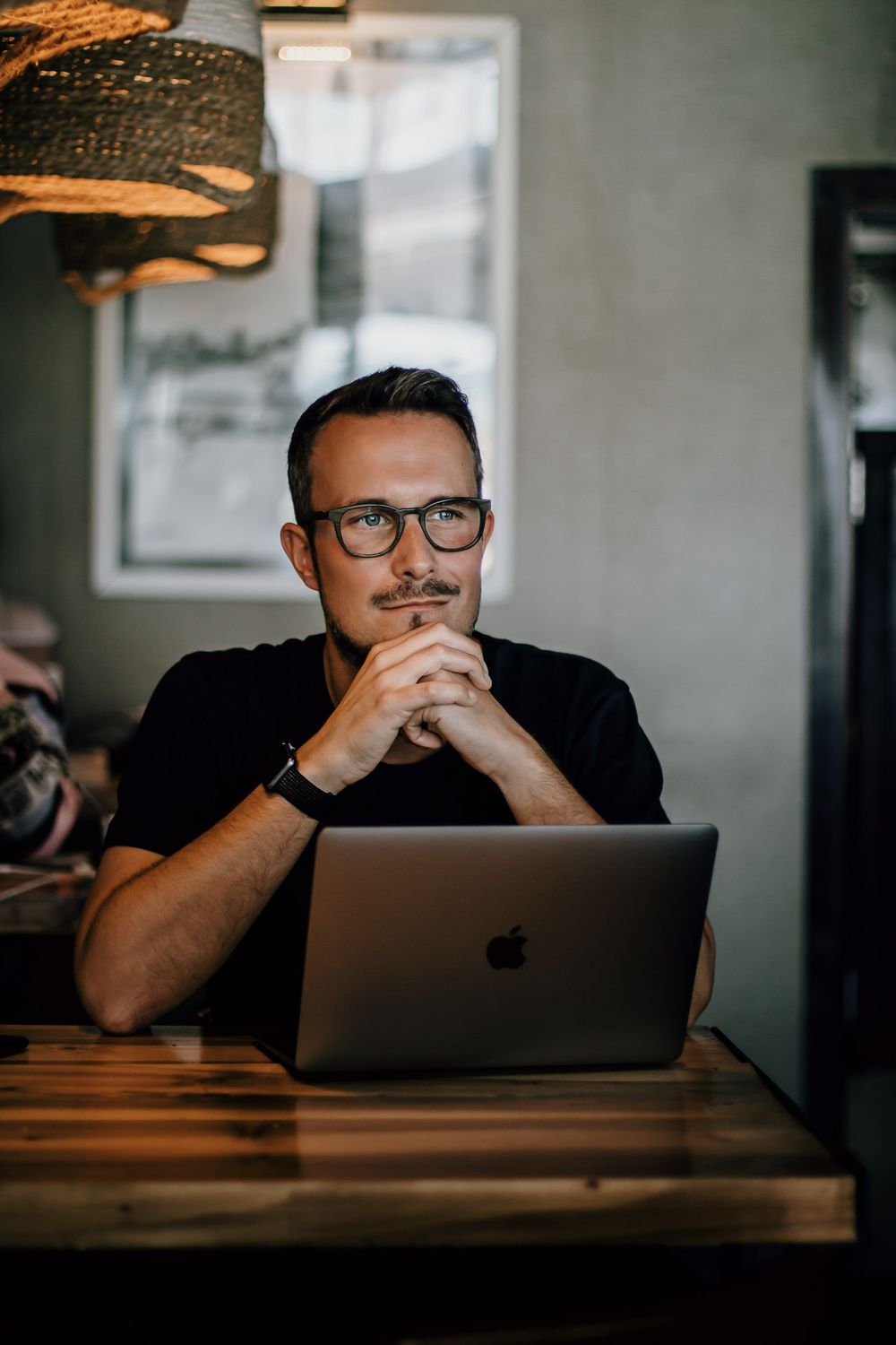 Creative professional working in a Corralejo cafe - Business branding portraits by Andrius